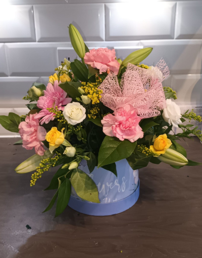 Secret Whispers - This luxury arrangement of flowers in a stylish Hat Box will be remembered for a long time!